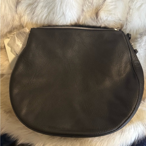 SOLD
BURBERRY Large Black leather/Fur Shoulder bag silver hardware - Picture 9 of 14